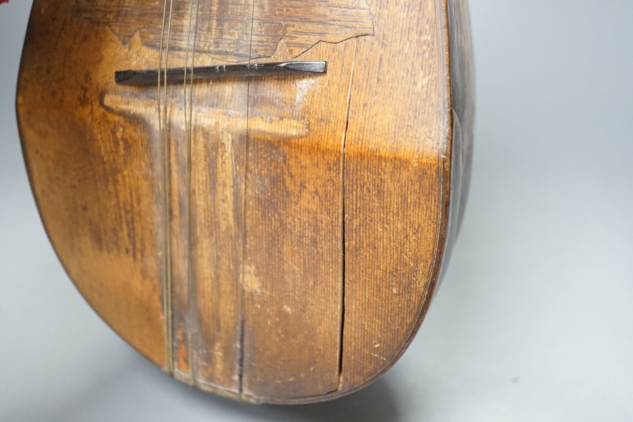 A rosewood and boxwood mandolin with bone pegs, circa 1900